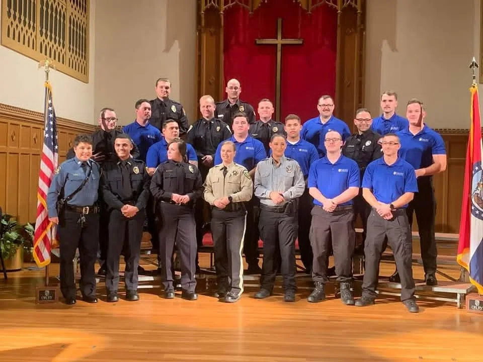 Drury Law Enforcement Academy graduates and instructors gathered on stage